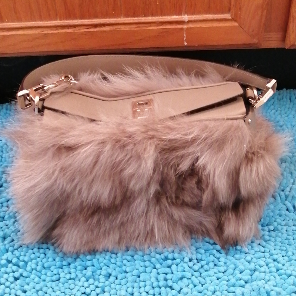 Michael Kors fur leather shoulder bag.